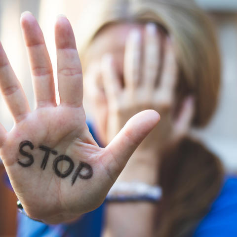 Stop written on hand - stock