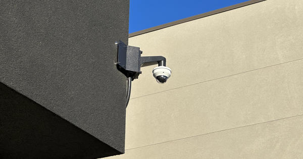 CCTV Camera On Side Of Building Stock